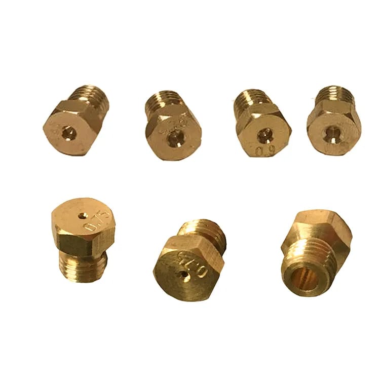 Gas burner nozzles or jets